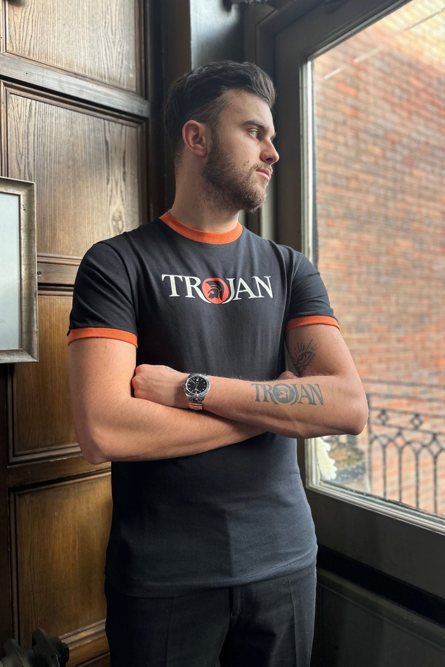 TC/1014 Black & Orange Logo Ringer - T-Shirt