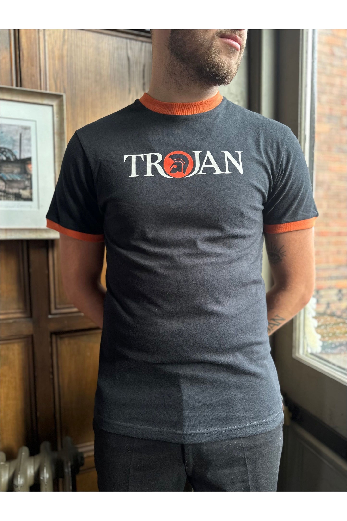 TC/1014 Black & Orange Logo Ringer - T-Shirt